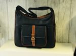 navy leather bag with tan trim