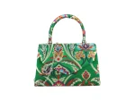 Green print occasion bag with handle and silver chain shoulder strap