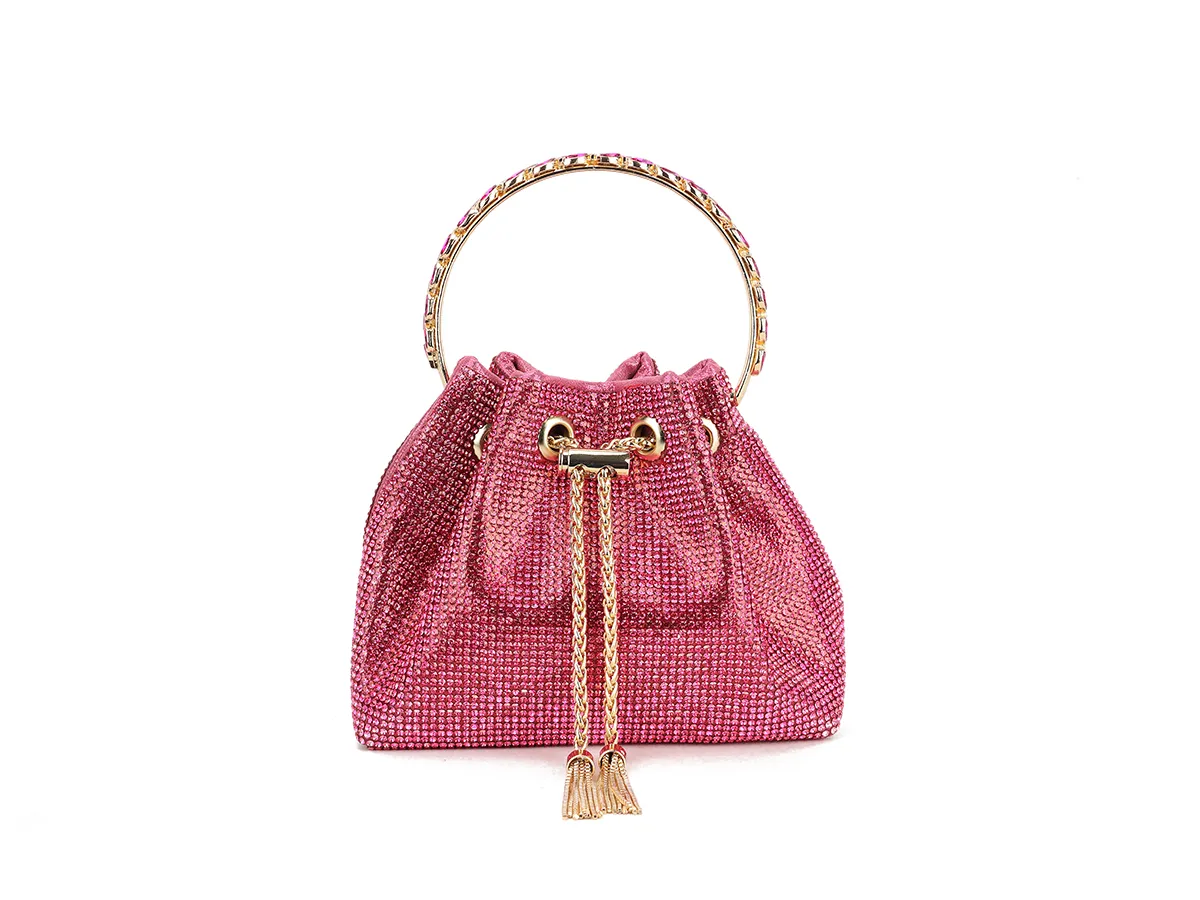 Fuchsia pink sparkle occasion bag with gold ornate handle Height 15cm Width 18.2cm Depth 9cm